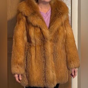 Luxurious genuine, red fox fur coat
